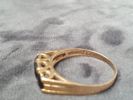 RING, 18K GULD, 3 svarta stenar