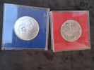 Mynt, 2 st, silver, 50 kr samt dräktsmycke, silver