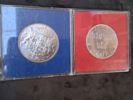 Mynt, 2 st, silver, 50 kr samt dräktsmycke, silver